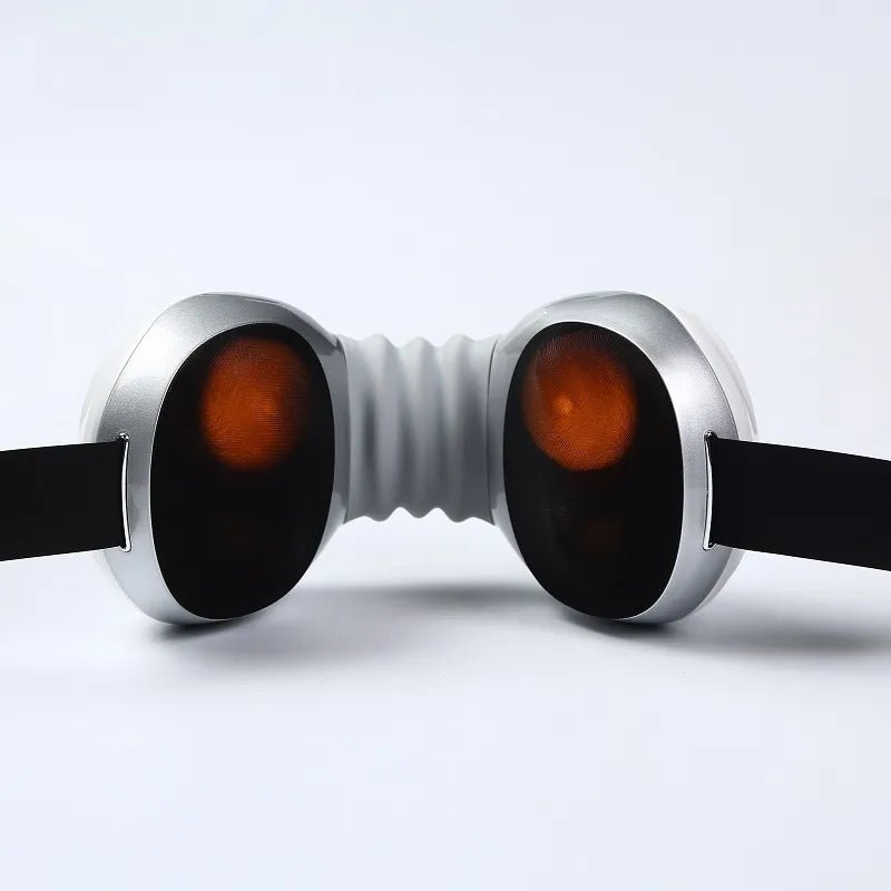 Neck Massager with Heat Rear view of a white neck massager showing two large massage nodes and black straps.