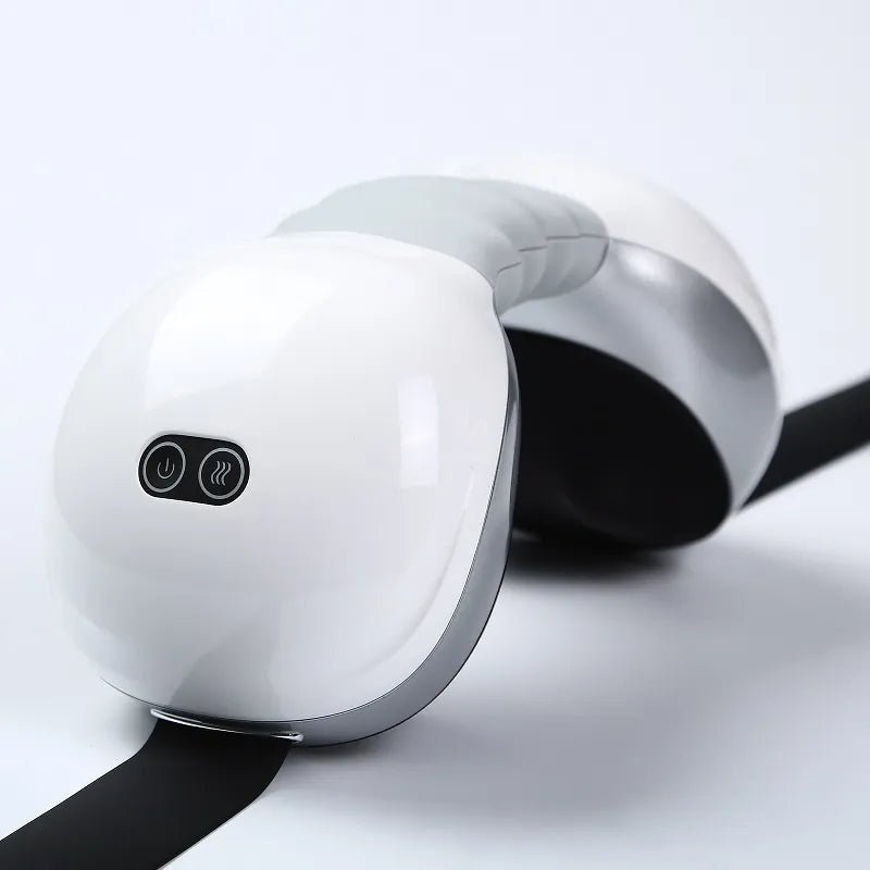 Neck Massager with Heat Side profile of a white neck massager with a grey flexible center and control buttons.