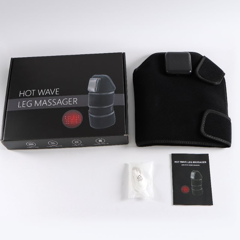 Infrared Hot Wave Leg Massager The leg massager product packaging including the box, wrap, manual, and charging cable.