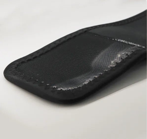 Infrared Hot Wave Leg Massager Extreme close-up of the black fabric strap and stitching of the leg massager wrap.