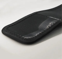Infrared Hot Wave Leg Massager Extreme close-up of the black fabric strap and stitching of the leg massager wrap.