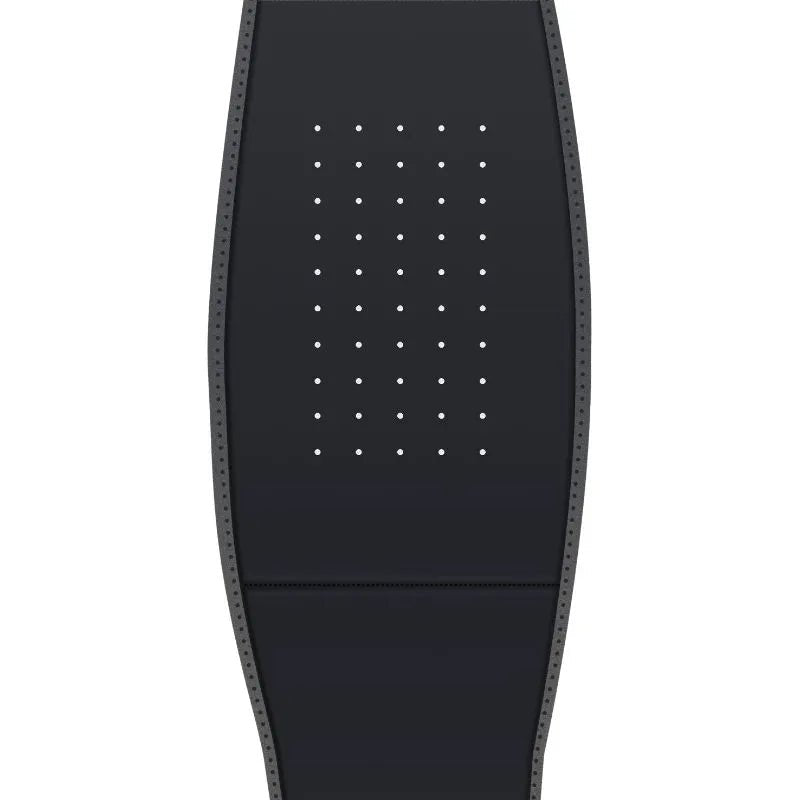 Hot Wave Massage Belt Close-up of the interior side of a black belt featuring a grid of small perforations.