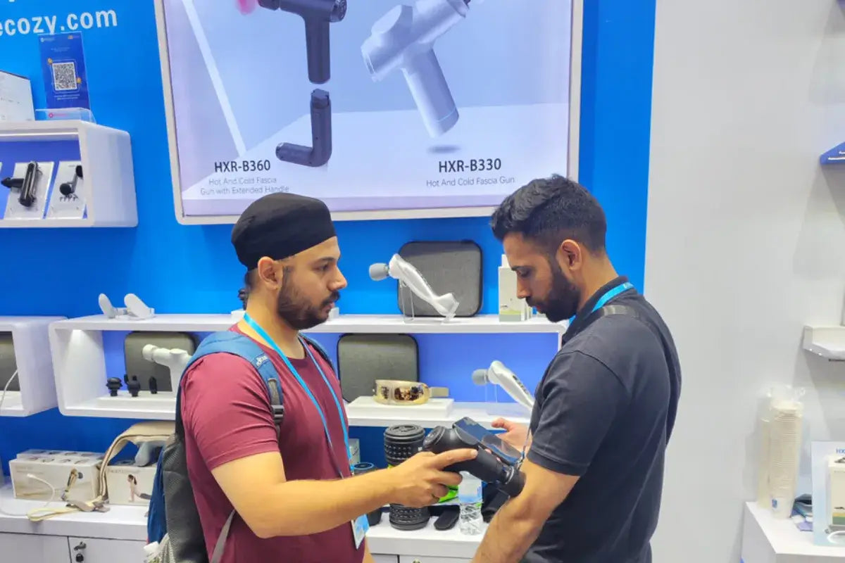 Customer trial massage gun at 2025_canton_fair-ECOZY
