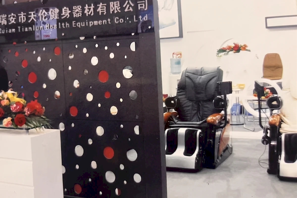 Our_Story_-_historical_exhibition_booth_of_Ruian_Tianlun_Health_Equipment_displaying_luxury_leather_massage_chairs-Pages-Ecozy