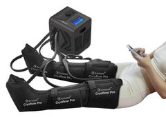 Cryoflow Pro Cold&Hot therapy Dynamic Compression Recovery System Person using the Cryoflow Pro compression system on their legs while reclining and holding a phone.
