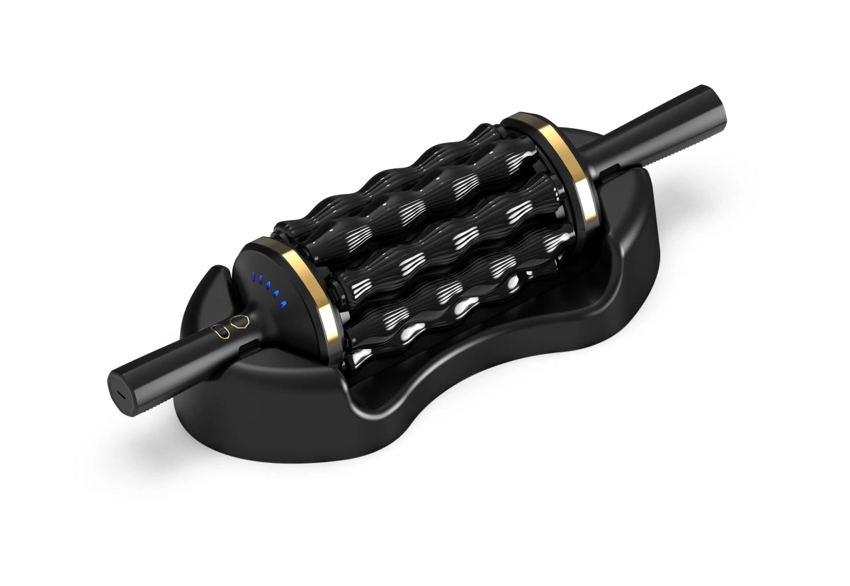 Rolling Percussive Massager Angled view of a black percussive rolling massager sitting in its custom charging dock.