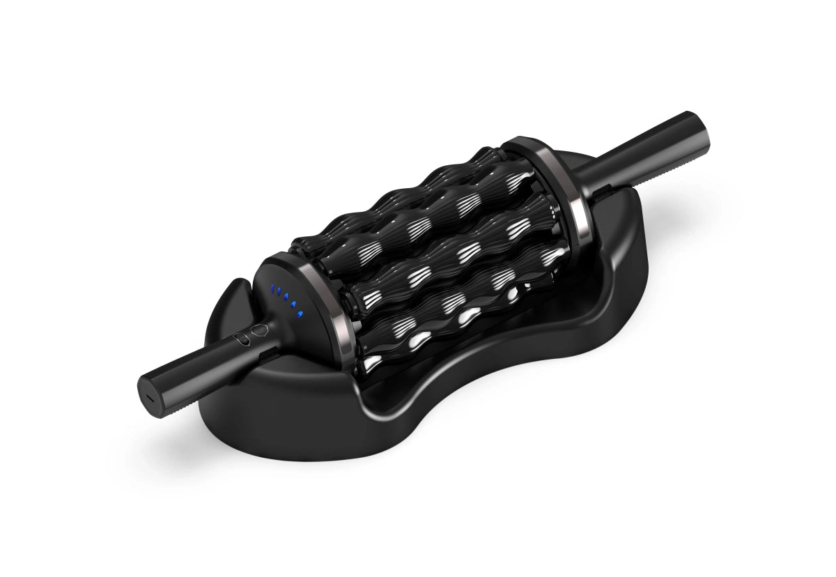 Rolling Percussive Massager Silver and black rolling percussive massager resting on a black base against a white background.